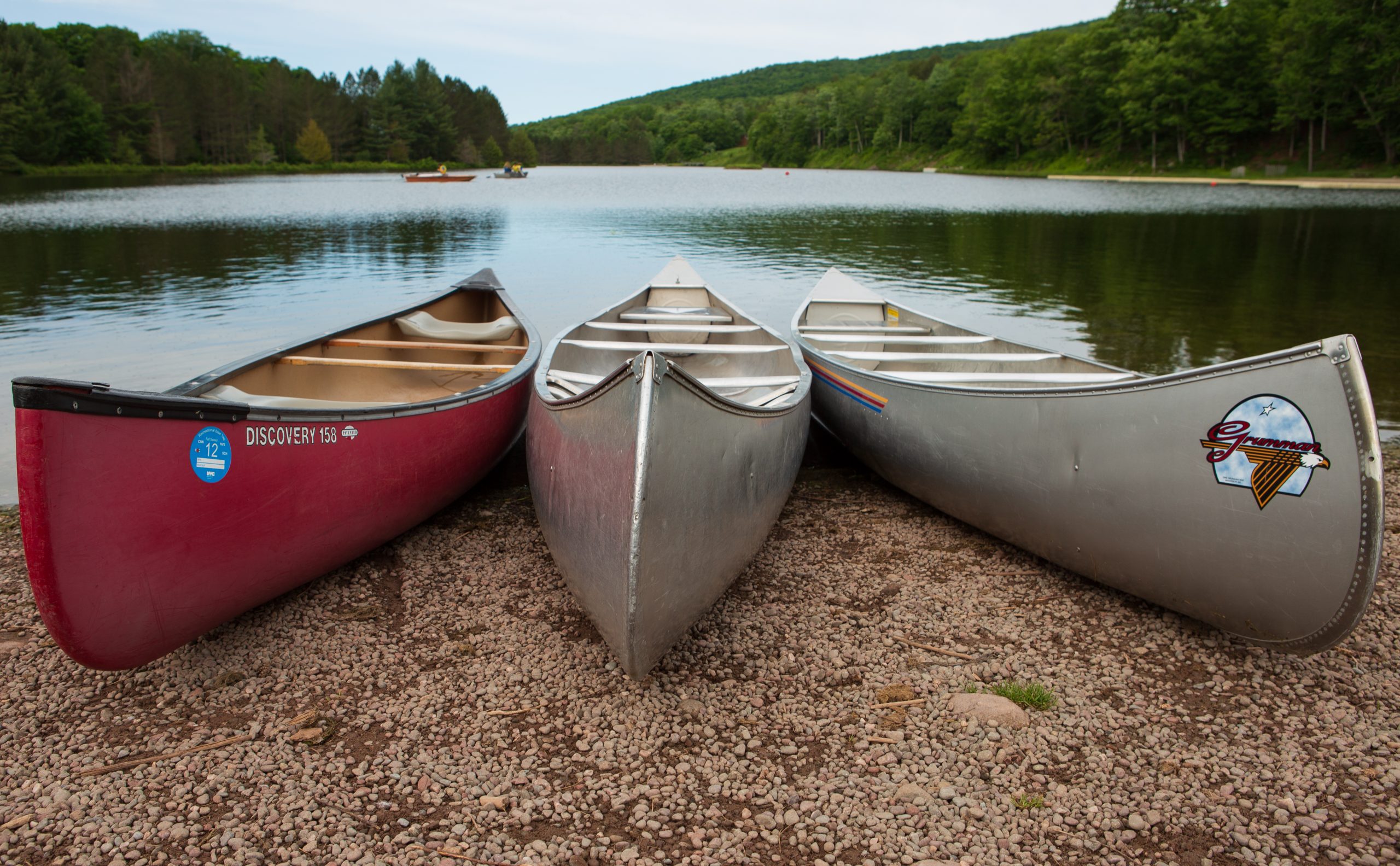 3 canoes on lake cole