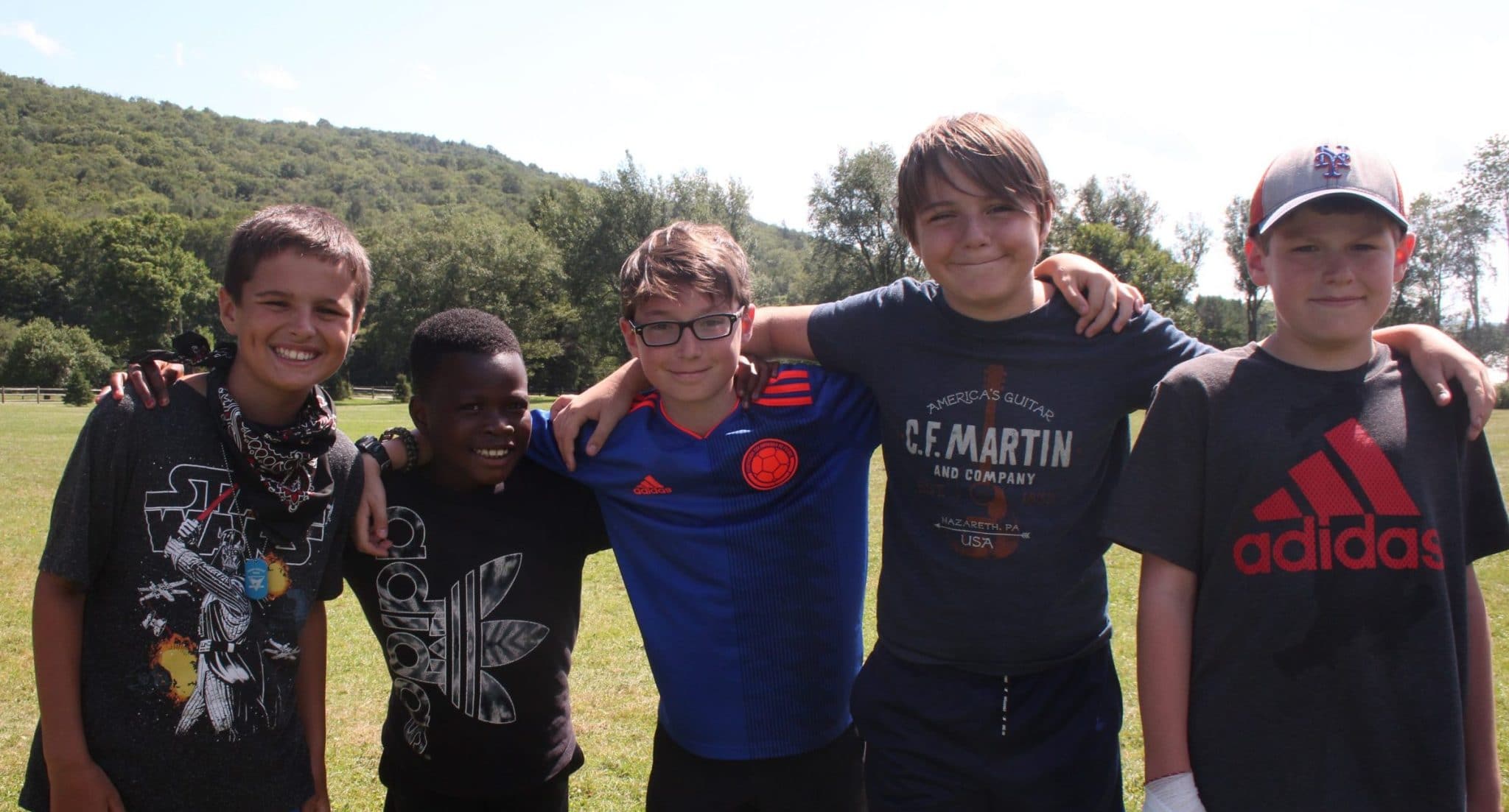 5 posed boys at camp